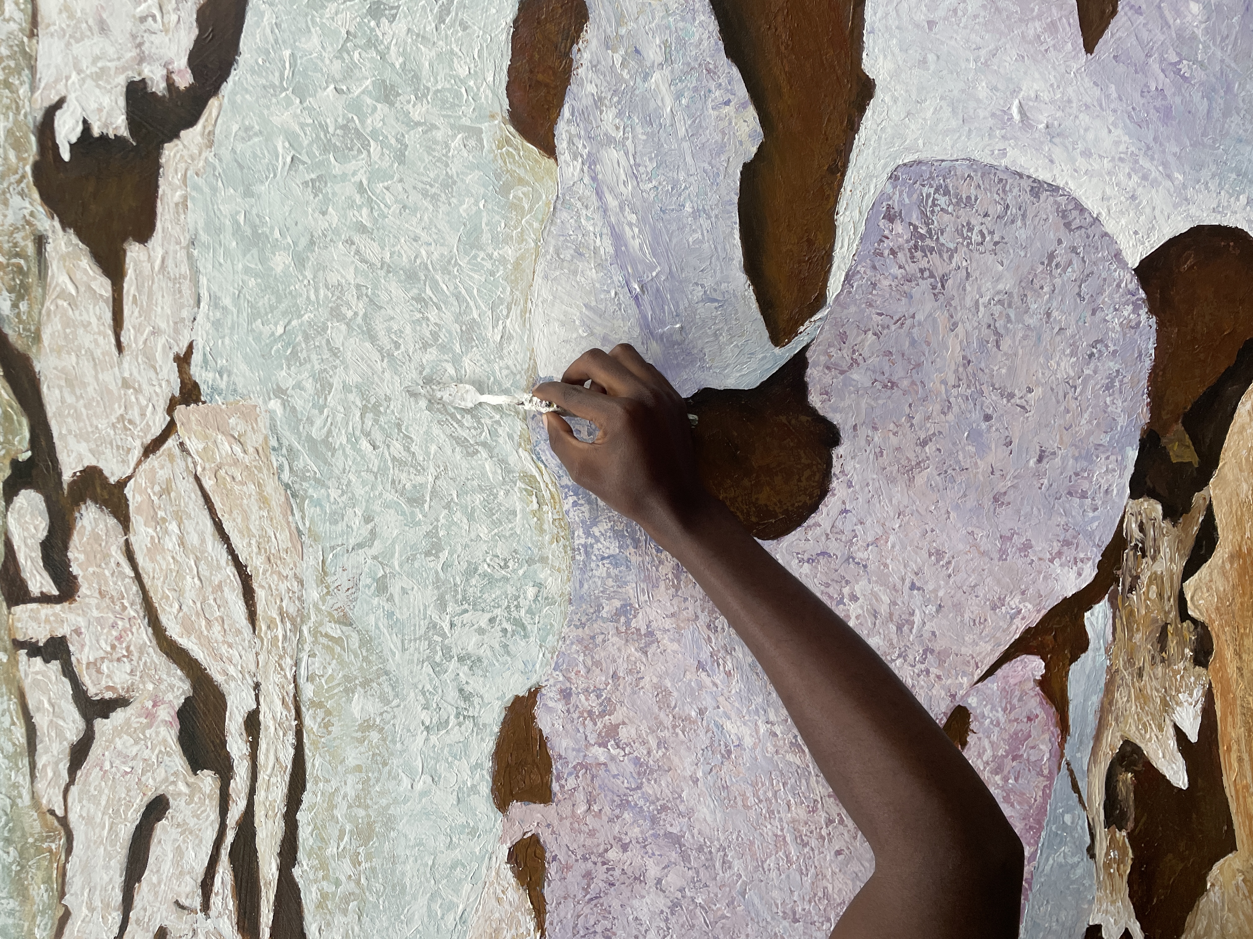 Richard Mwizerwa working in the studio